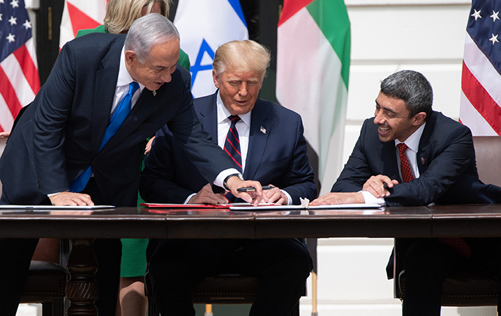 Benjamin Netanyahu, Donald Trump, and Abdullah bin Zayed Al-Nahyan  participate in the signing of the Abraham Accords at the White House in Washington, DC, September 15, 2020