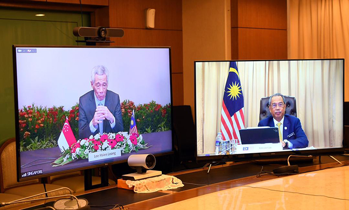Prime Minister Lee Hsien Loong and Malaysian PM Muhyiddin Yassin