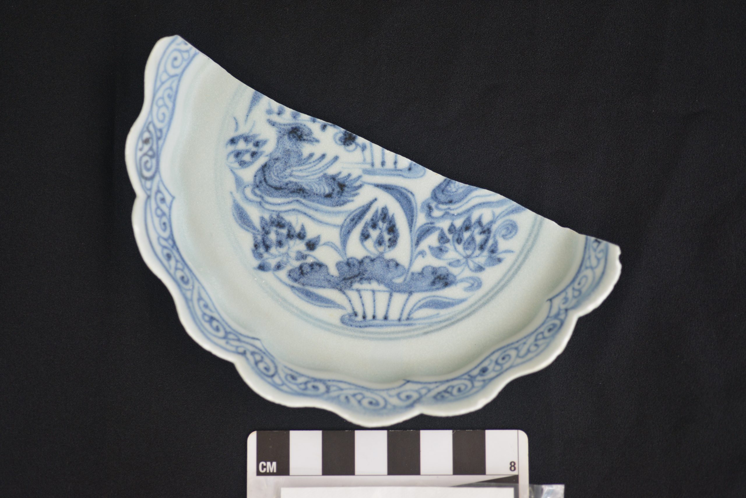 Small and fine blue-and-white dish with lobed rim from SW1